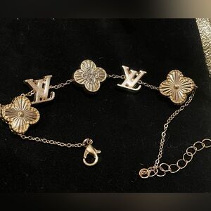 LVee gold crystals monogram logo bracelet pretty to match your bag or purse😍